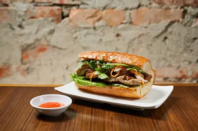 Sandwich with sliced grilled pork chop