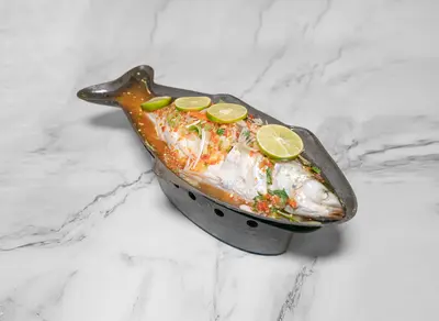 Steamed Fish with Lime on Stove Tray with